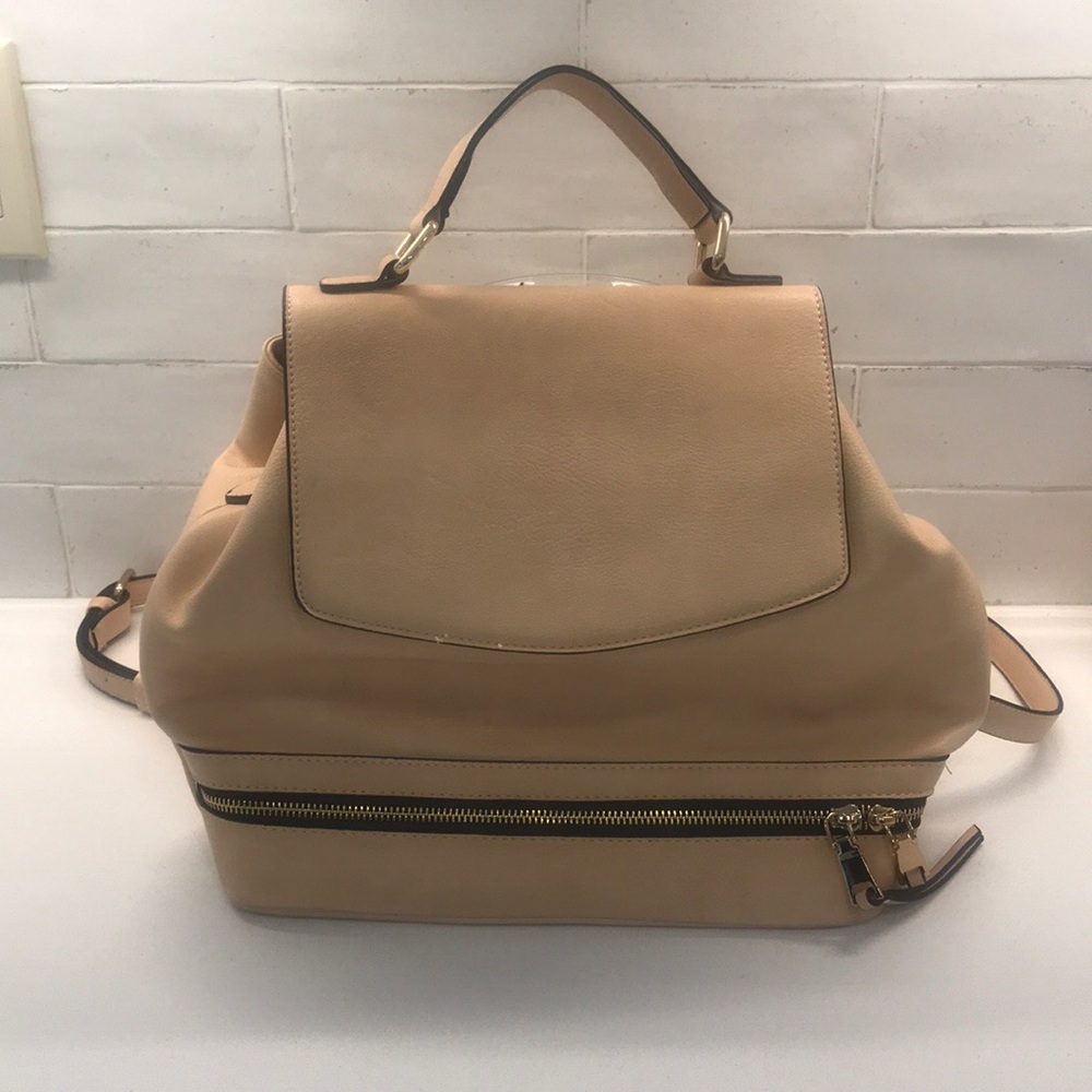 Adjustable mini back pack. Perfect for fall!